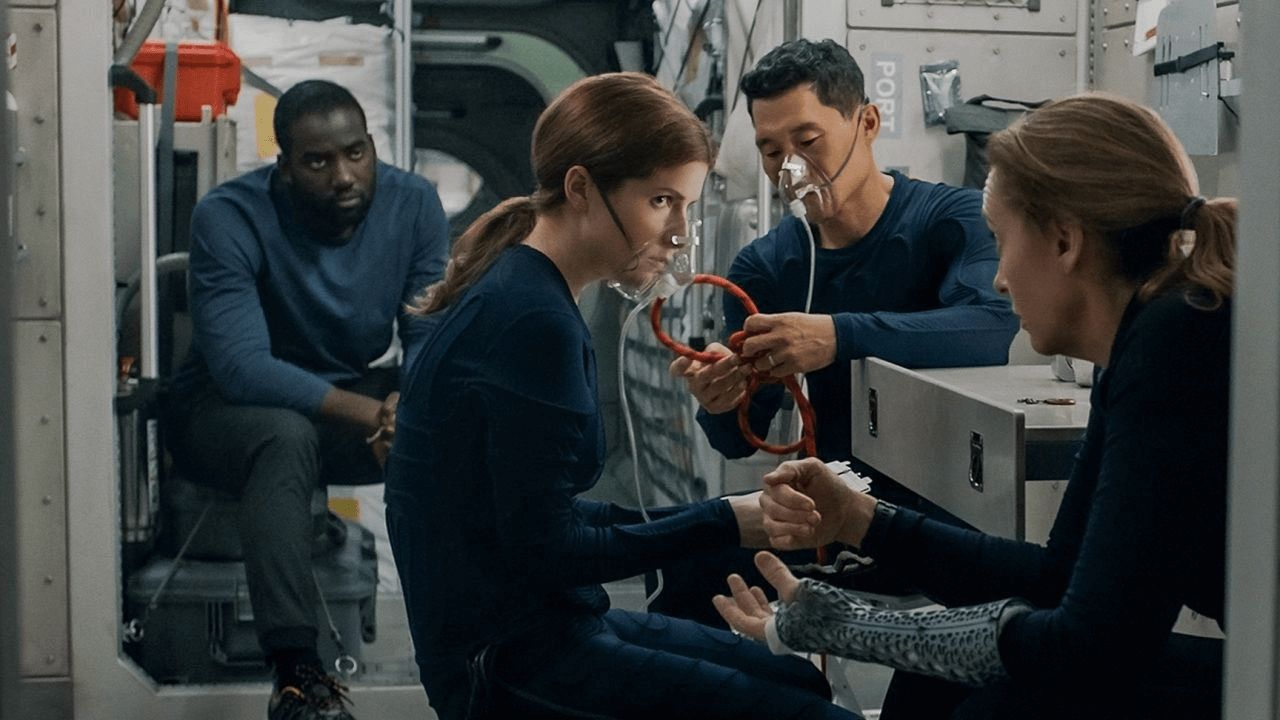 Toni Colllete (right), Anna Kendrick (center) and Daniel Dae Kim portray Mars-bound astronauts with Shamier Anderson (left) as a launch engineer-turned-surprise passenger in Netflix's "Stowaway."