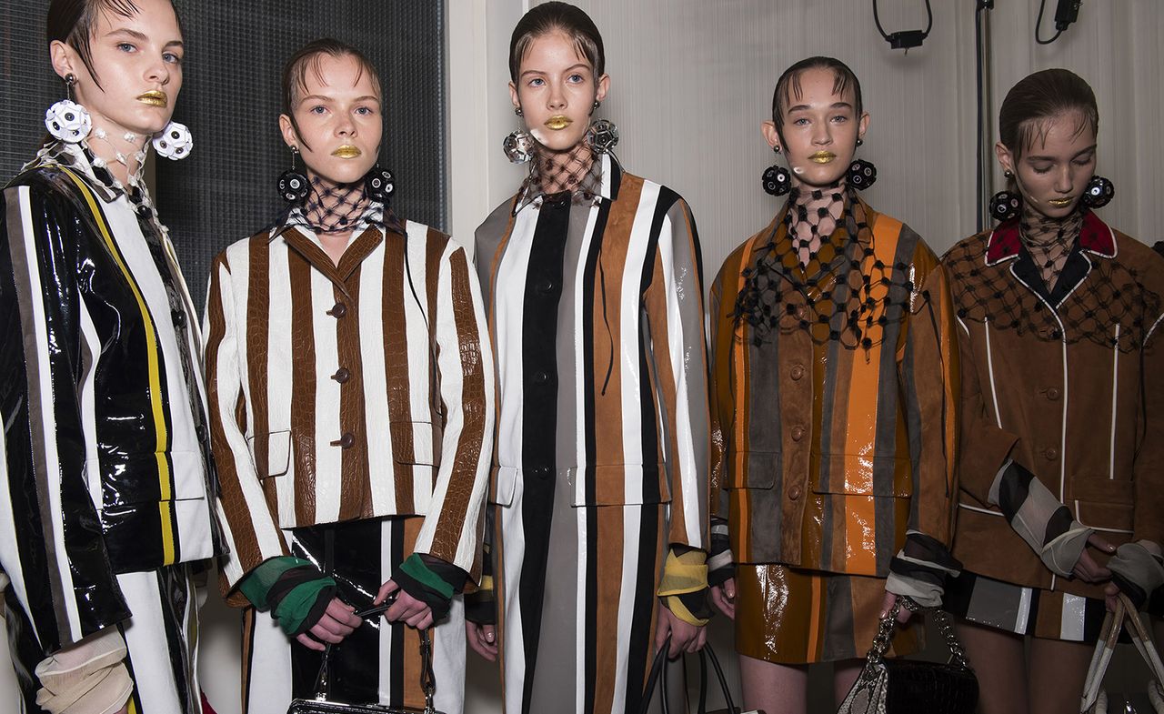 Moody, melancholic and rawly feminine, Miuccia Prada’s spring show saw vertical stripes spliced with tweed and python