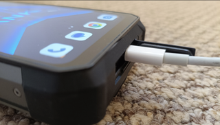 Phone being charged on carpet