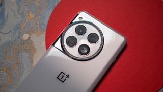 Back view of OnePlus 12 Glacial White showing camera modules