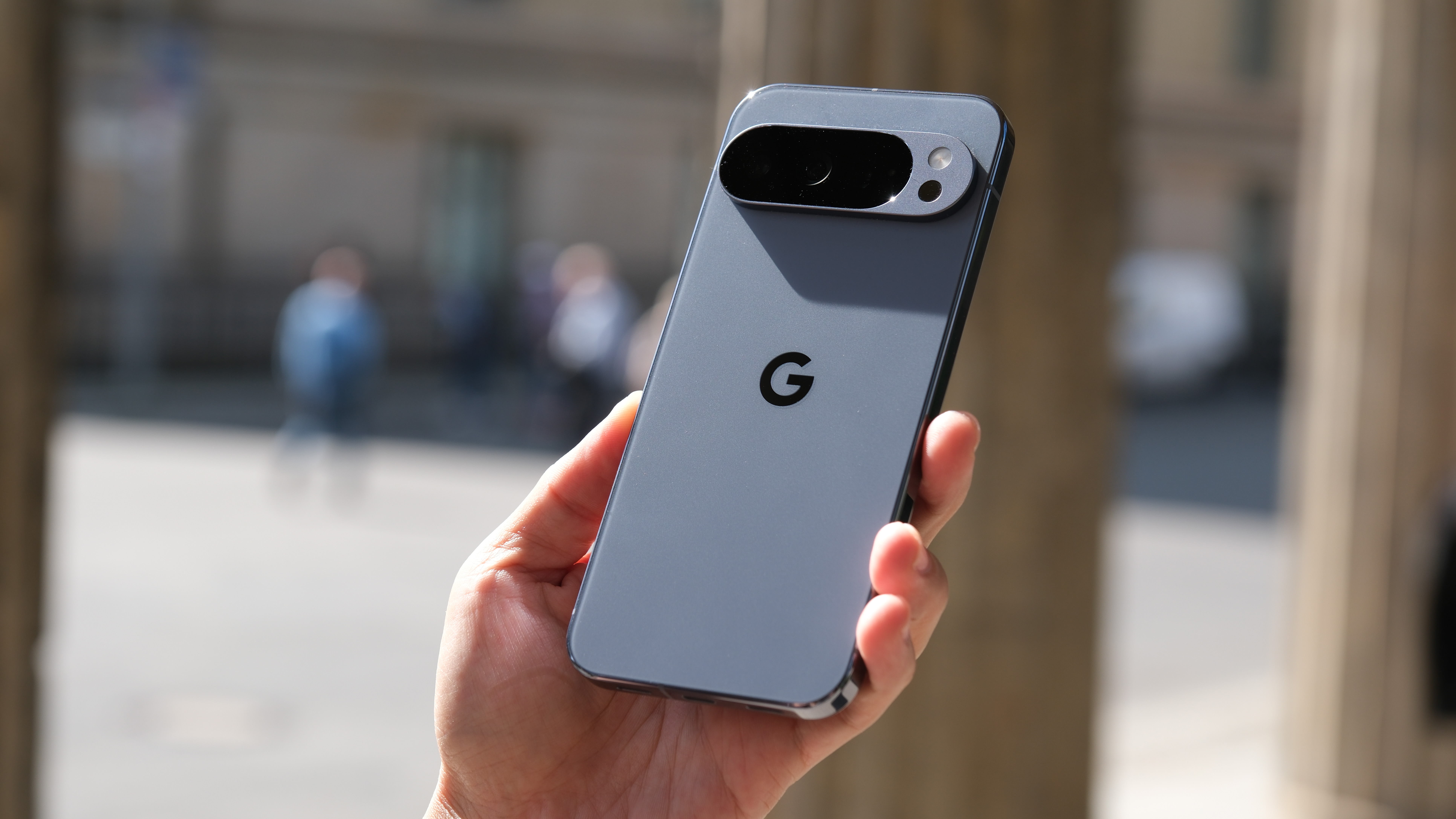 Google Pixel 10 Pro XL held in a hand