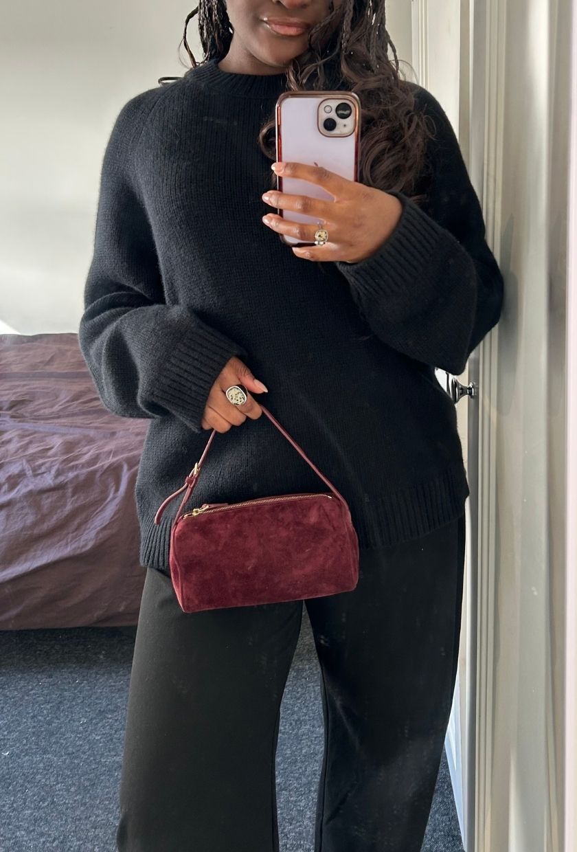 Who What Wear UK's Brittany Davy wearing the black COS Rounded Wool Crew-Neck Jumper in a Size M