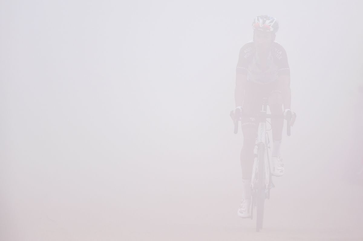 Can you spot the rider in the mist?