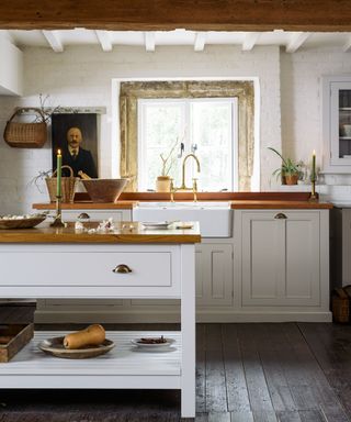 Modern farmhouse kitchen with free standing units and mismatched cabinets