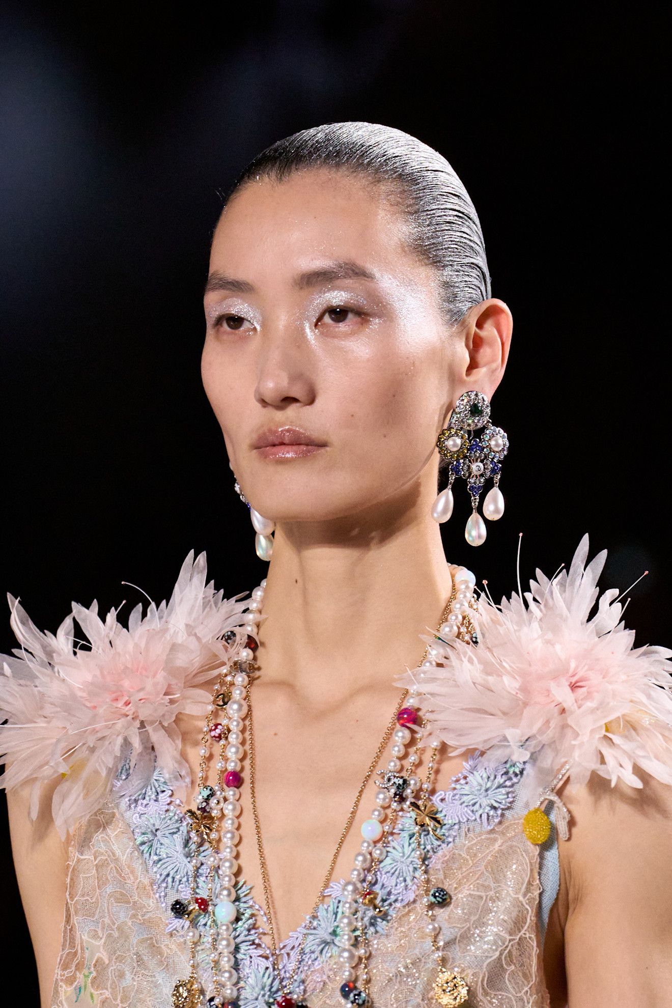 A model at the Chanel F/W 26 show.