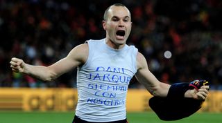 JOHANNESBURG, SOUTH AFRICA - JULY 11: Andres Iniesta of Spain celebrates scoring the winning goal during the 2010 FIFA World Cup South Africa Final match between Netherlands and Spain at Soccer City Stadium on July 11, 2010 in Johannesburg, South Africa. (Photo by Jamie McDonald/Getty Images)