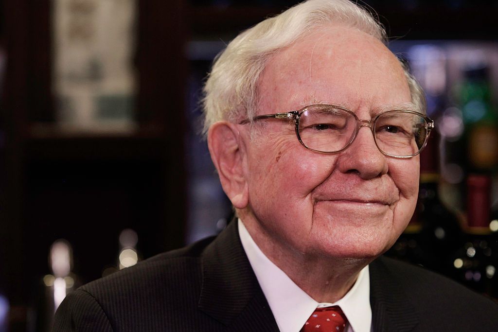 Closeup of Warren Buffett, chairman and CEO of Berkshire Hathaway, listening to a question during a television interview at Smith &amp; Wollensky restaurant in New York, September 8, 2015