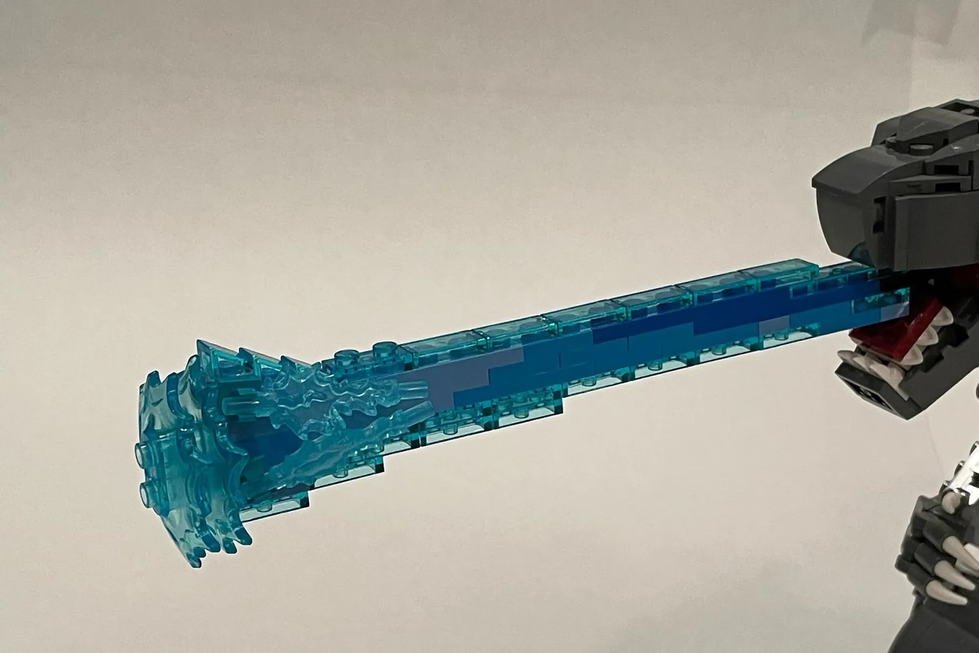 Godzilla LEGO set from three different angels including a shot of the blue beam coming out of his mouth