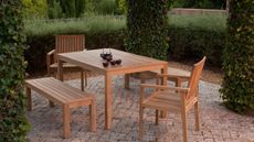 how to clean outdoor wooden furniture: teak table and chairs