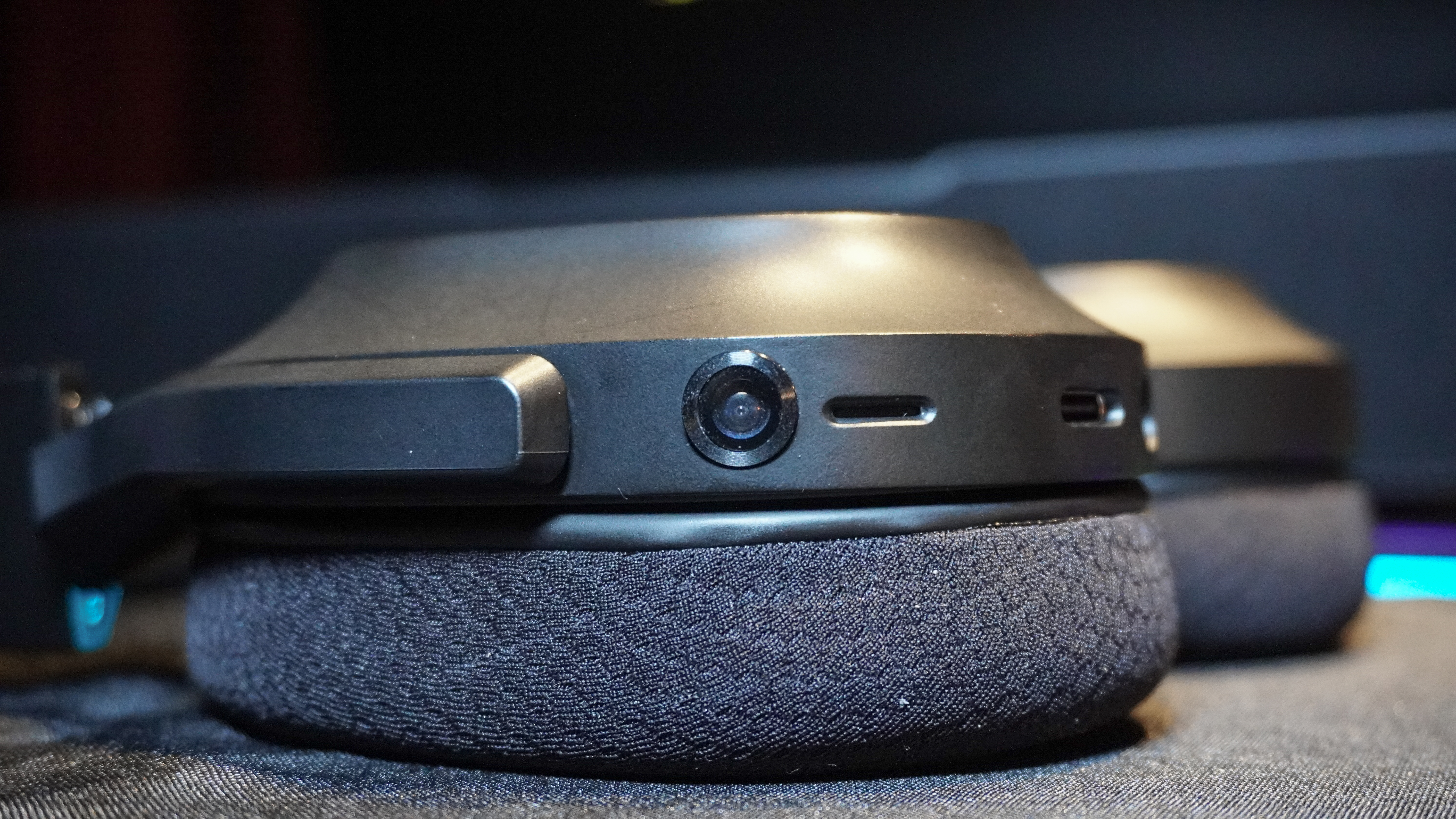 A closeup shot of one of the camera's built into the earcups of Razer's Project Motoko headset