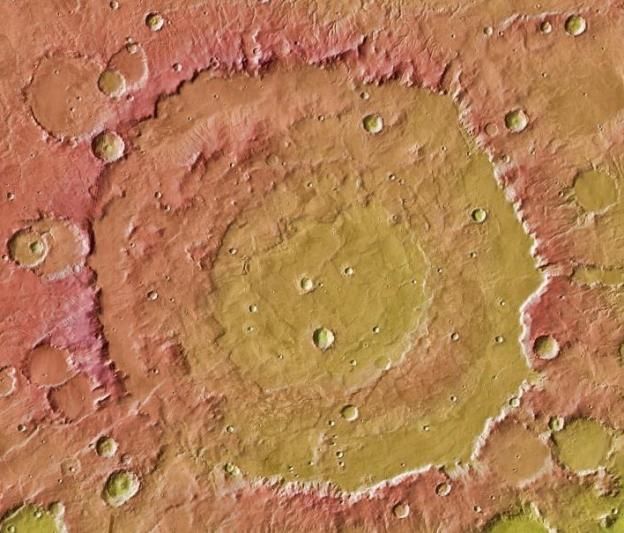 NASA&#039;s Mars Odyssey orbiter captured this topographical and infrared image of the massive Huygens Crater in 2011.