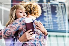 Young teenage girl reuniting with her mother in airport