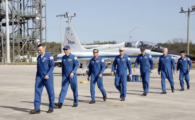 Shuttle Crew Arrives at NASA Spaceport for Training