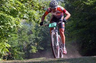 TJ Woodruff crests the top of Suicide Hill in route to the cross country and stage race win.