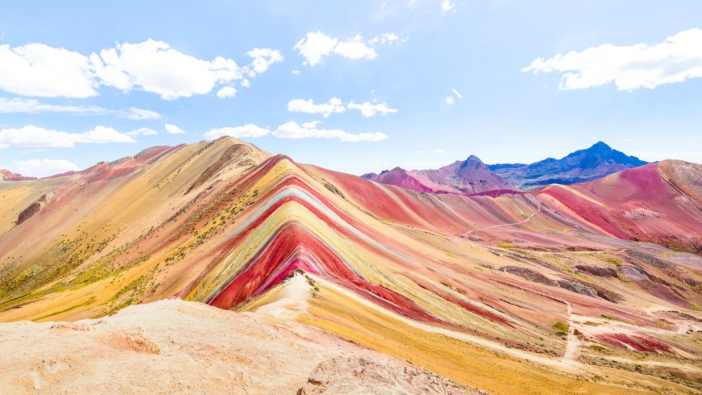 Colourful striped mountain. Orange, red and yellow stripes show the distinct layers of the sedimentary deposits.
