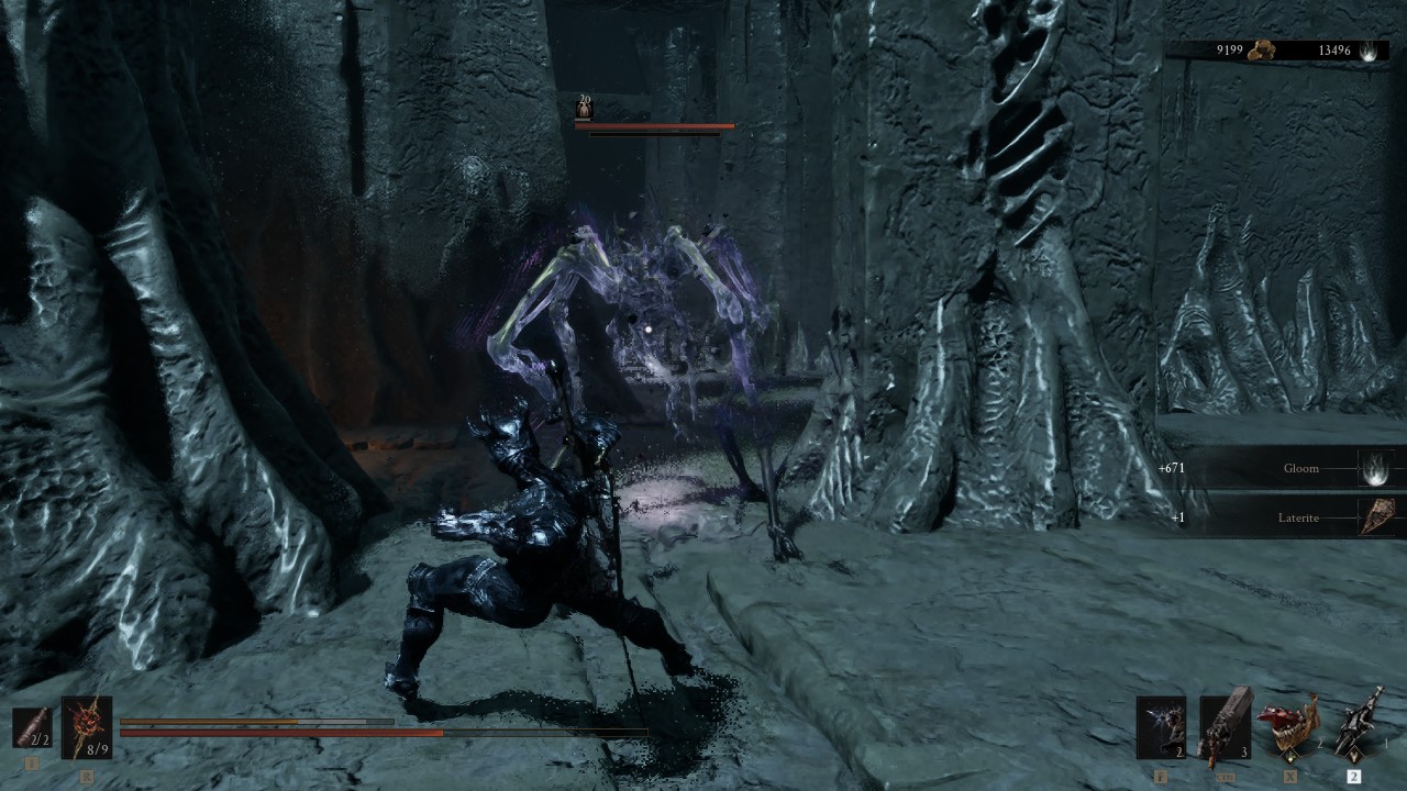 Fighting a glowing spider monster in Mortal Shell 2