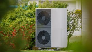 heat pump in garden outside home