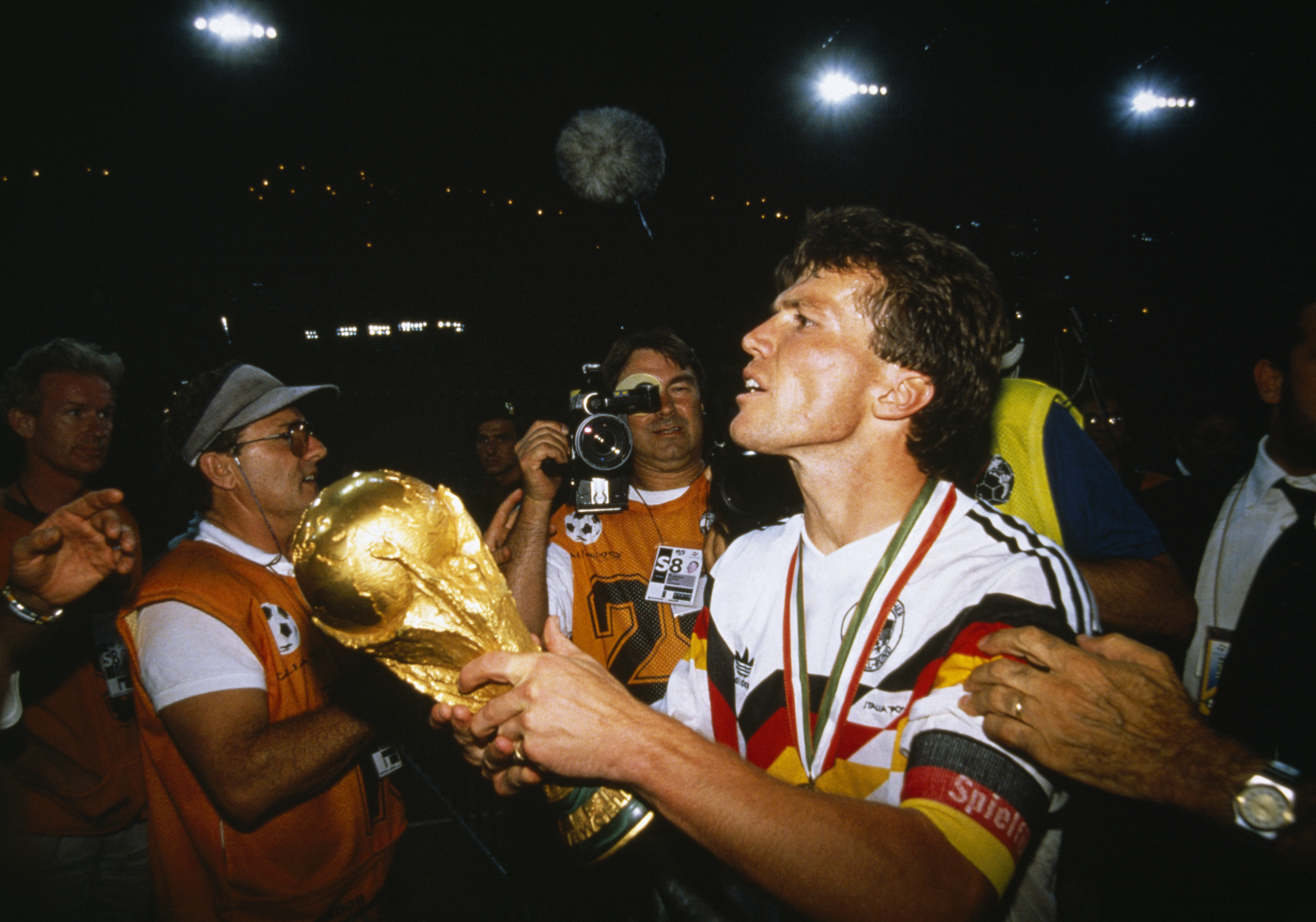 West Germany captain Lothar Matthaus holds the World Cup trophy after victory in the final against Argentina in the 1990 final.