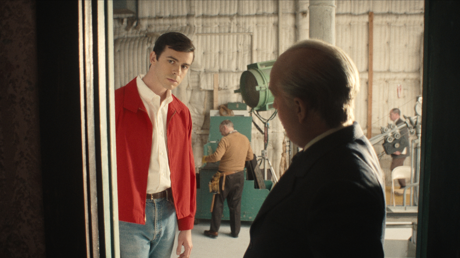 (L to R) Joey Pollari as Anthony Perkins, Tom Hollander as Alfred Hitchcock in episode 302 of Monster: The Ed Gein Story.