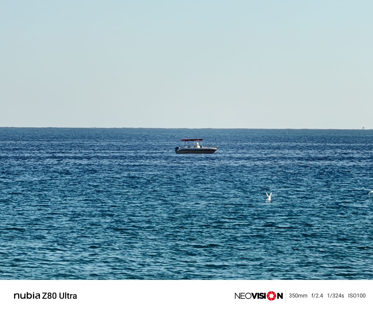 A boat on a blue ocean