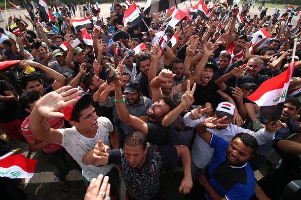 Protesters inside the Green Zone in Baghdad.