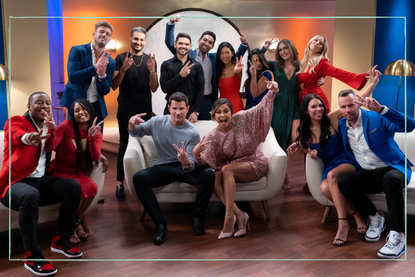 a Love is Blind cast photo showing all the contestants posing on a sofa