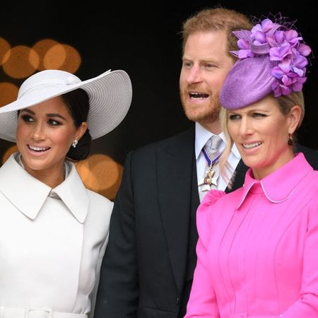 Meghan, Duchess of Sussex, Britain's Prince Harry, Duke of Sussex, and Zara Phillips leave after attending the National Service of Thanksgiving for The Queen's reign at Saint Paul's Cathedral in London on June 3, 2022 as part of Queen Elizabeth II's platinum jubilee celebrations. - Queen Elizabeth II kicked off the first of four days of celebrations marking her record-breaking 70 years on the throne, to cheering crowds of tens of thousands of people. But the 96-year-old sovereign's appearance at the Platinum Jubilee -- a milestone never previously reached by a British monarch -- took its toll, forcing her to pull out of a planned church service.