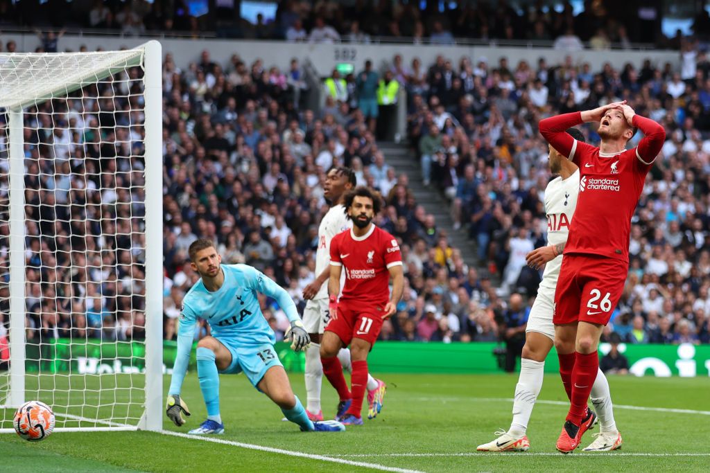 Andrew Robertson of Liverpool reacts after seeing his effort saved by Guglielmo Vicario of Tottenham Hotspur during the Premier League match between Tottenham Hotspur and Liverpool FC at Tottenham Hotspur Stadium on September 30, 2023 in London, England. (Photo by Marc Atkins/Getty Images)