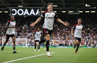 Tom Cairney of Fulham celebrates after scoring his teams second goal during the Premier League match between Fulham FC and Sheffield United at Craven Cottage on October 07, 2023 in London, England. (Photo by Ryan Pierse/Getty Images)