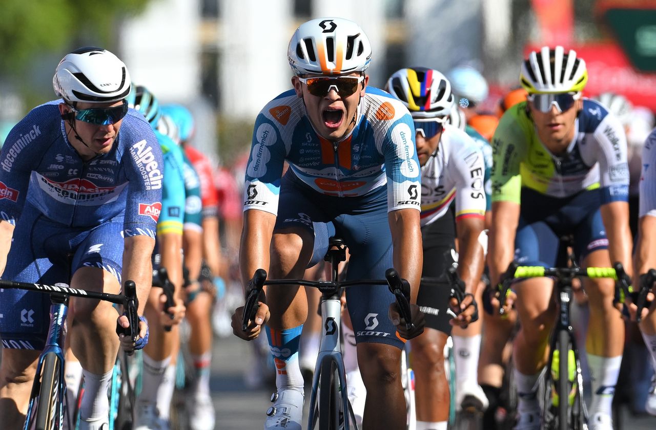 SEVILLE, SPAIN - AUGUST 21: Stage winner Pavel Bittner of Czech Republic and Team dsm-Firmenich PostNL (C) celebrates at finish line during La Vuelta, 79th Tour of Spain 2024, Stage 5 a 177km stage Fuente del Maestre to Seville / #UCIWT / on August 21, 2024 in Seville, Spain. (Photo by Tim de Waele/Getty Images)