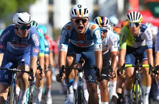 SEVILLE, SPAIN - AUGUST 21: Stage winner Pavel Bittner of Czech Republic and Team dsm-Firmenich PostNL (C) celebrates at finish line during La Vuelta, 79th Tour of Spain 2024, Stage 5 a 177km stage Fuente del Maestre to Seville / #UCIWT / on August 21, 2024 in Seville, Spain. (Photo by Tim de Waele/Getty Images)