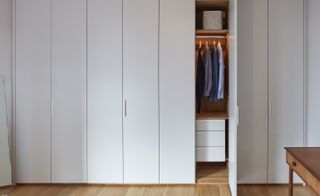 New, discreetly contemporary wardrobes in the apartment's two main bedrooms help the interiors feel sleek and streamlined