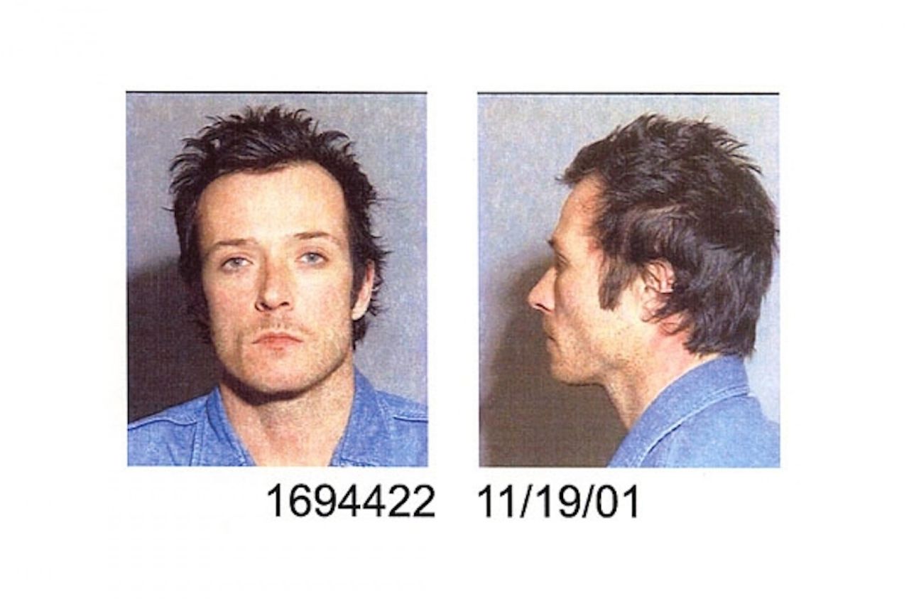 Scott Weiland. Arrested 2001 for battery. He spent 12 hours in jail, then returned to the stage that night. He was later fined and placed on probation.