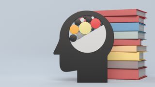 A 3D-render of a silhouetted head representing AI, containing colored circled to indicate a brain, with a stack of books of different colors to the right. Decorative: the objects are set against a grey backdrop.