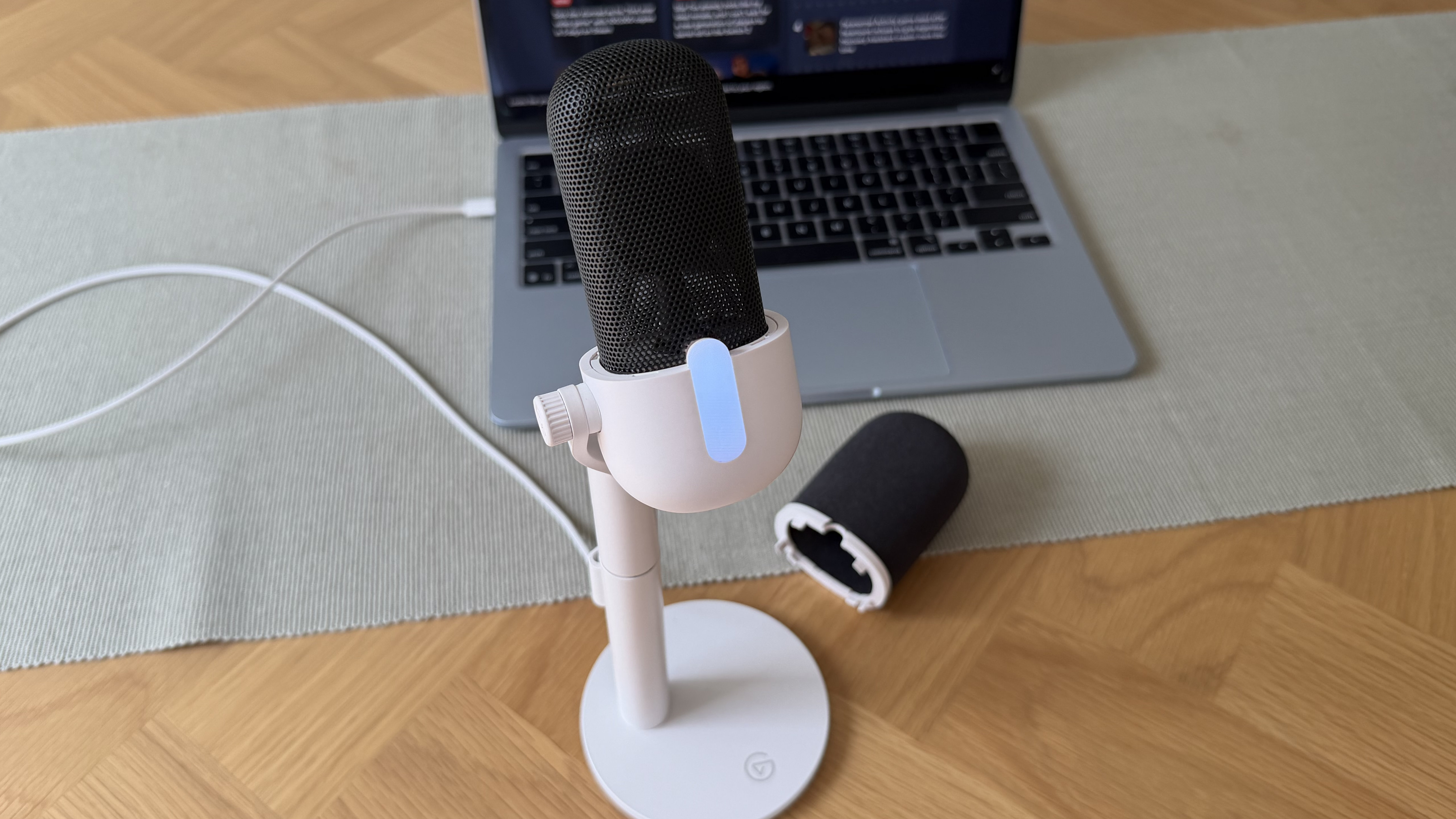 An Elgato Wave Neo with its wind guard/pop filter off