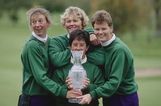 Kitrina Douglas (left), Laura Davies (back centre), Trish Johnson (right) and Alison Nicholas (bottom) hold up the Solheim Cup in 1992