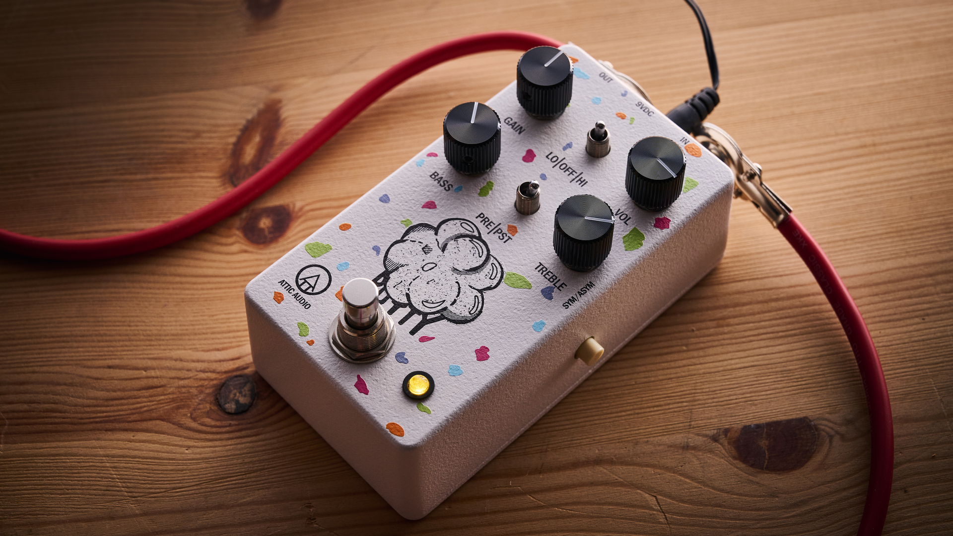 A Attic Audio Putty Saturation Preamp pedal on a wooden floor