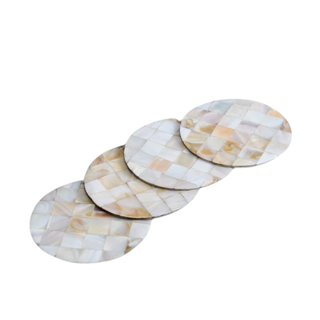 four mother of pearl coasters