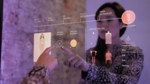 Mastercard's smart mirror being used to order clothes to the fitting room