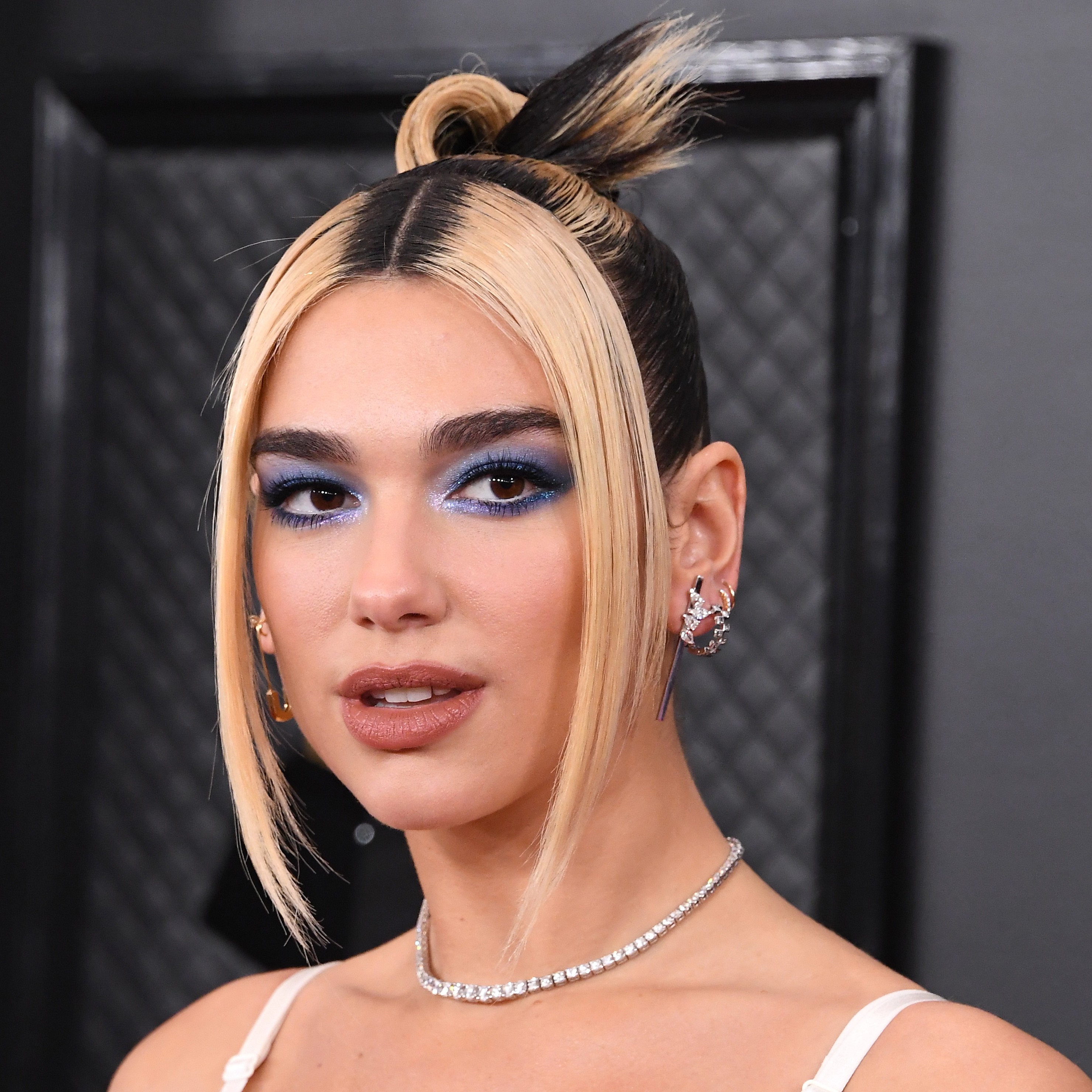 Dua Lipa shows off her stripey highlights.