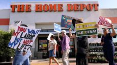 Anti-ICE protesters march outside a Home Depot in Pasadena, California.