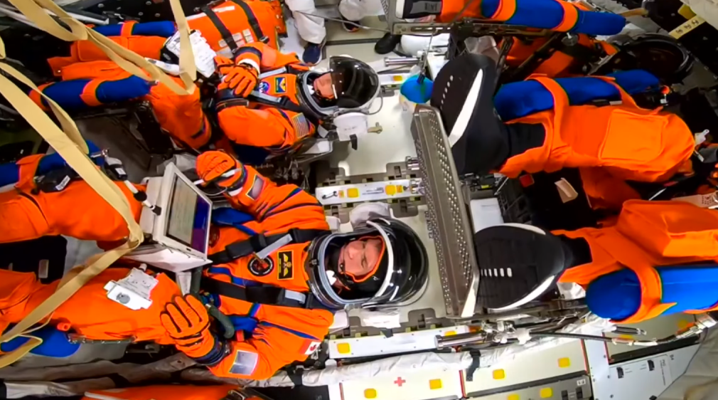 The Artemis II crew inside the capsule.