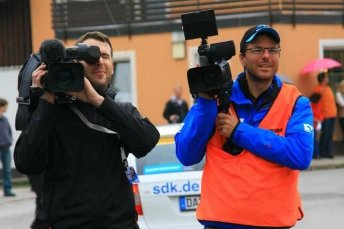 Camera crews await the riders during the Stage 4 time trial