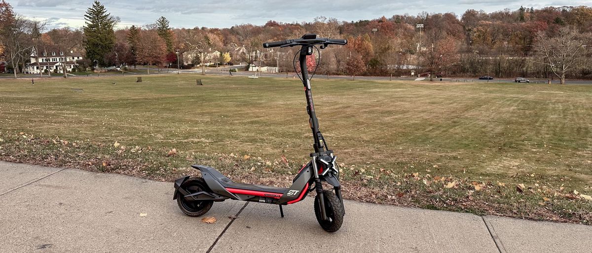 Segway Kickscooter ZT3 Pro parked on sidewalk