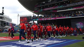 England&#039;s cricket team walking onto the pitch of their first T20 World Cup 2024 match.