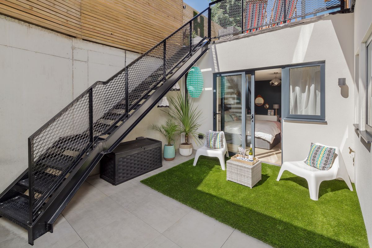 basement patio with bedroom and sliding doors
