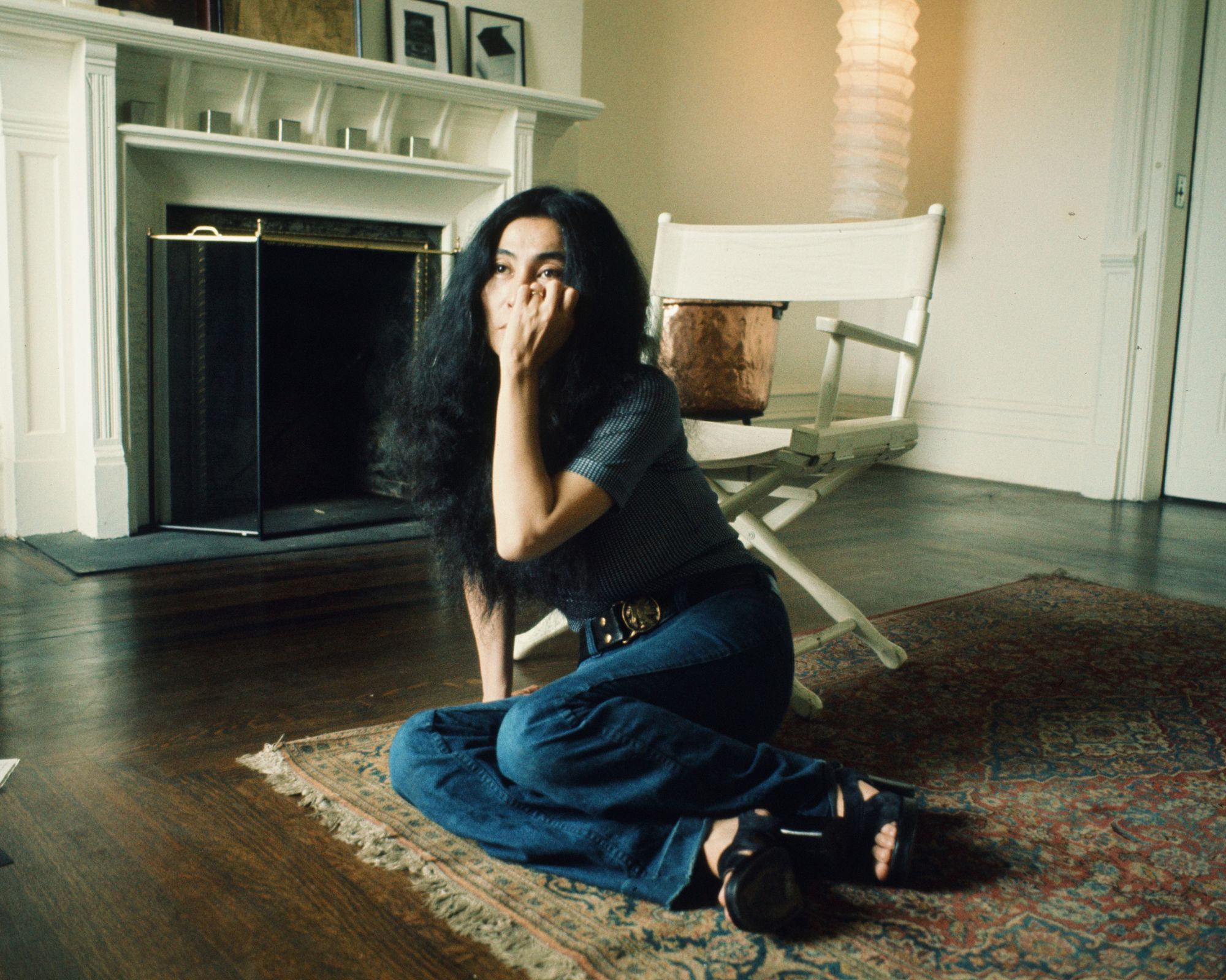 yoko ono in her and john lennon's living room