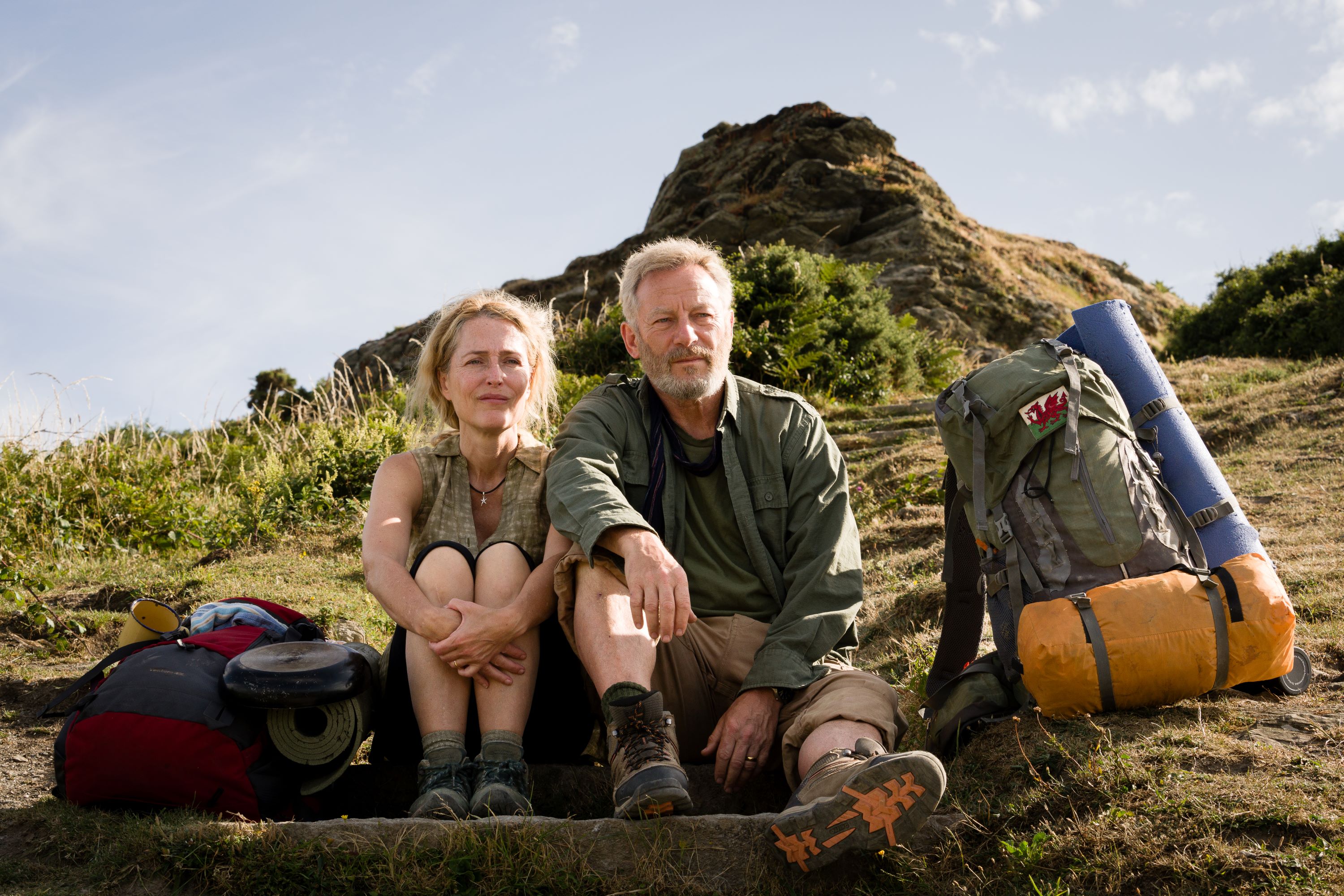Gillian Anderson and Jason Isaacs as Raynor and Moth Winn on the South West Coast Path