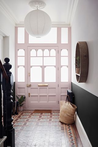 An entrance door painted pink