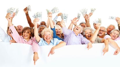 picture of happy elderly people holding money in their raised hands